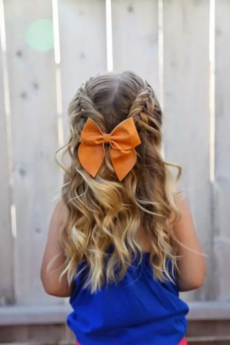 first-holy-communion-hairstyle-with-bow