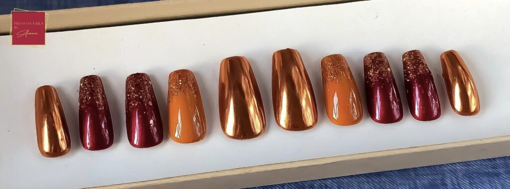 burnt-orange-and-burgundy-nails