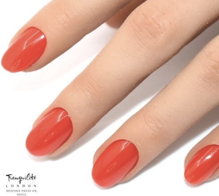 burnt-orange-nail-polish-on-short-nails